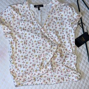 Size large YMI Collection white with pink and yellow flowers crop top